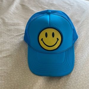 bright blue aviator nation smiley face trucker hat